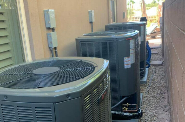 A collection of neatly installed exterior AC units, symbolizing the professional AC installation services offered by Bob's Repair in Las Vegas
