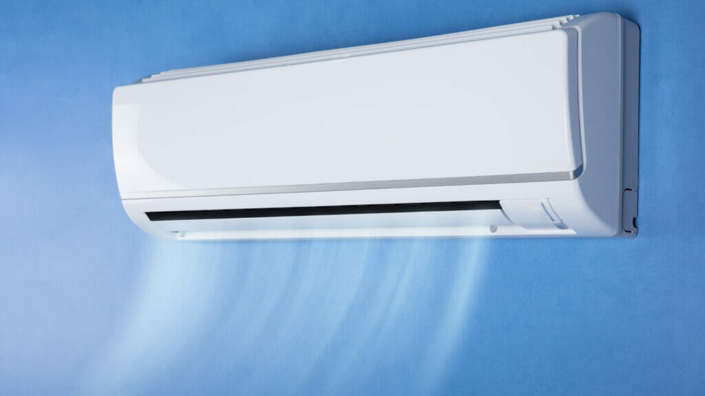 An interior view of a ductless AC unit mounted on a wall, representing the advanced, energy-efficient cooling option discussed in the article