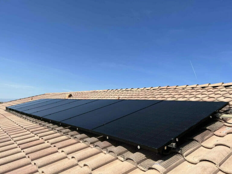 A set of solar panels professionally installed on a residential rooftop, illustrating the high-quality solar panel installation services offered by Bob's Repair in sunny Henderson, NV