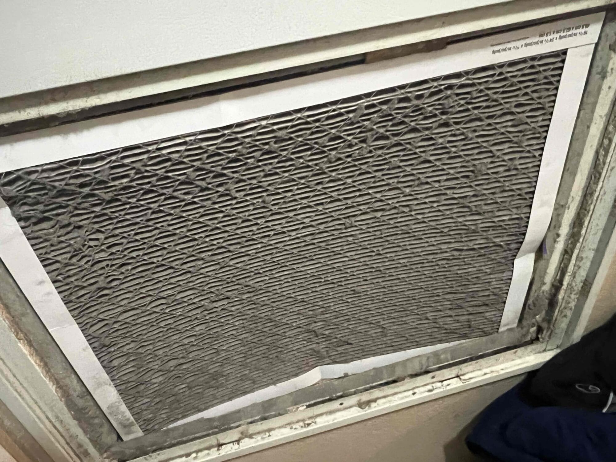 Extremely dirty and clogged return air filter inside the home.