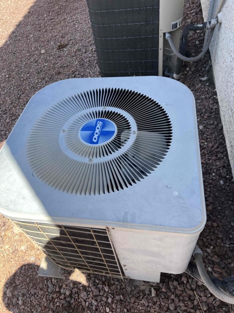 Exterior view of the aging Goodman 5000 series condenser.