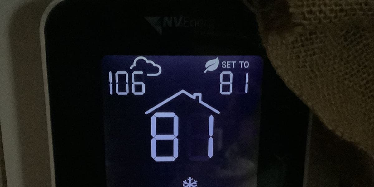 Wall thermostat showing 106 degrees outside, set to 81, with 81 degrees inside
